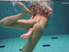 DustyPorn presents: Underwater with a busty naked babe as she swims