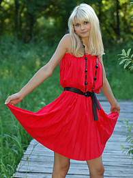 DustyPorn presents: Naughty teen appears in her sexy red dress and starts removing it passionately and moving slowly.