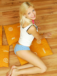 DustyPorn presents: Amazing blonde nude teen decided to place herself at the attic of her wooden house on four orange pillows for her dirty intention.